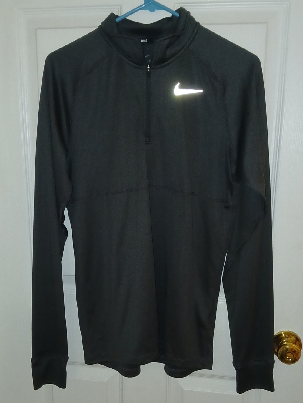 Nike Black Quarter-Zip Long-Sleeve Pullover with White Swoosh